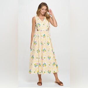 NWT Meet Me In Santorini Citrus Midi Dress!! Featuring side cut out with ties.
